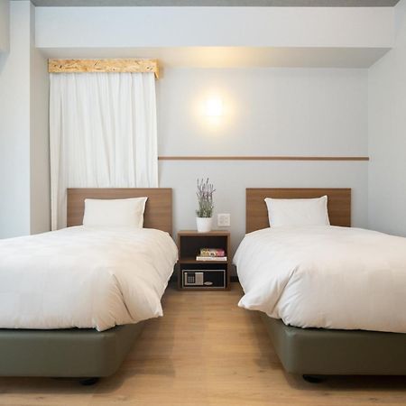 Отель Wayfarer Kyoto Shijo Экстерьер фото